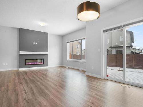 6 Kingsbury Circle, Spruce Grove, AB - Indoor Photo Showing Living Room With Fireplace