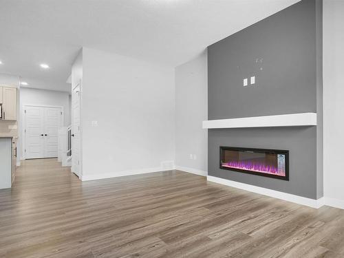 6 Kingsbury Circle, Spruce Grove, AB - Indoor Photo Showing Living Room With Fireplace