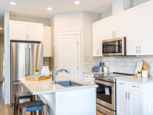 3215 Dixon Way, Edmonton, AB - Indoor Photo Showing Kitchen With Upgraded Kitchen