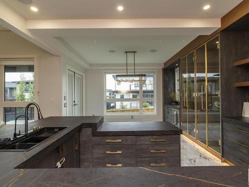 5106 Woolsey Link, Edmonton, AB - Indoor Photo Showing Kitchen With Double Sink