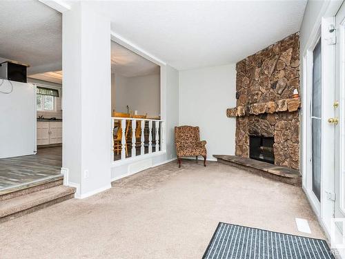 9105 Morinville Drive, Morinville, AB - Indoor With Fireplace