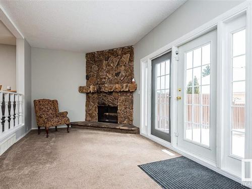 9105 Morinville Drive, Morinville, AB - Indoor With Fireplace