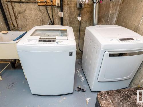 9105 Morinville Drive, Morinville, AB - Indoor Photo Showing Laundry Room