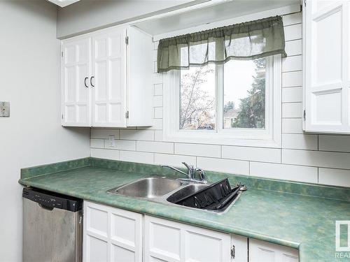 9105 Morinville Drive, Morinville, AB - Indoor Photo Showing Kitchen With Double Sink