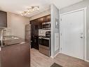 120 3315 James Mowatt Trail, Edmonton, AB  - Indoor Photo Showing Kitchen With Stainless Steel Kitchen With Double Sink 