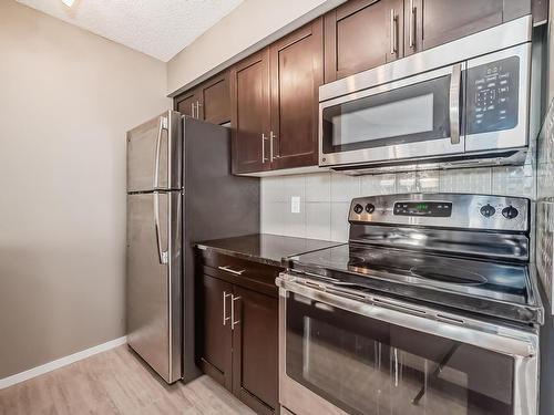 120 3315 James Mowatt Trail, Edmonton, AB - Indoor Photo Showing Kitchen