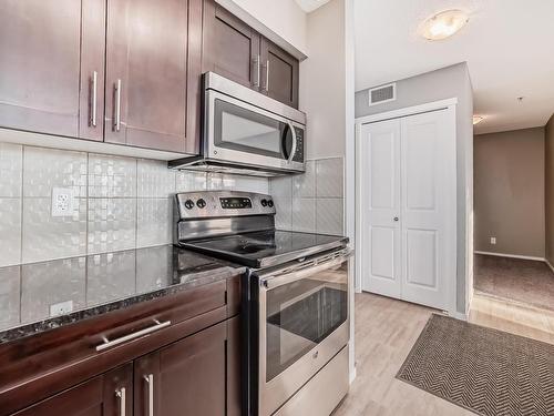 120 3315 James Mowatt Trail, Edmonton, AB - Indoor Photo Showing Kitchen