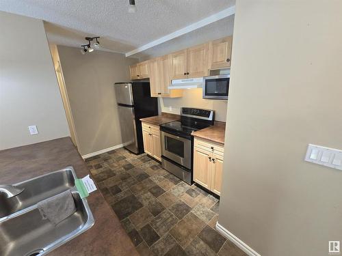 2104 901 16 Street, Cold Lake, AB - Indoor Photo Showing Kitchen With Double Sink