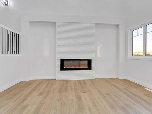 8410 228A Street, Edmonton, AB - Indoor Photo Showing Other Room With Fireplace