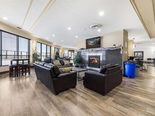 261 7805 71 Street, Edmonton, AB - Indoor Photo Showing Living Room With Fireplace