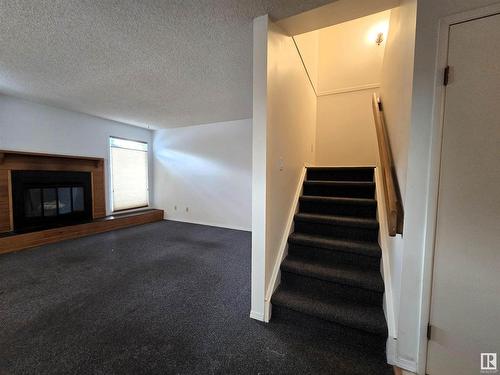 3582 42 Street Nw, Edmonton, AB - Indoor With Fireplace