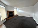 3582 42 Street Nw, Edmonton, AB  - Indoor With Fireplace 