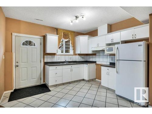 16105 73A Street, Edmonton, AB - Indoor Photo Showing Kitchen With Double Sink