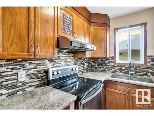 16105 73A Street, Edmonton, AB - Indoor Photo Showing Kitchen With Double Sink