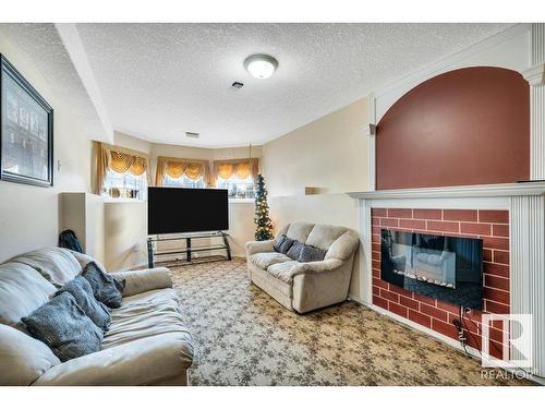 16105 73A Street, Edmonton, AB - Indoor Photo Showing Living Room With Fireplace