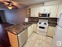 Edmonton, AB  - Indoor Photo Showing Kitchen With Double Sink 