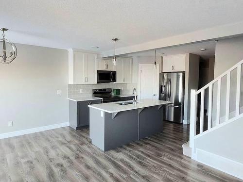 7635 Koruluk Place, Edmonton, AB - Indoor Photo Showing Kitchen With Double Sink