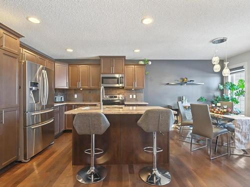 16827 51 Street Nw, Edmonton, AB - Indoor Photo Showing Kitchen With Upgraded Kitchen