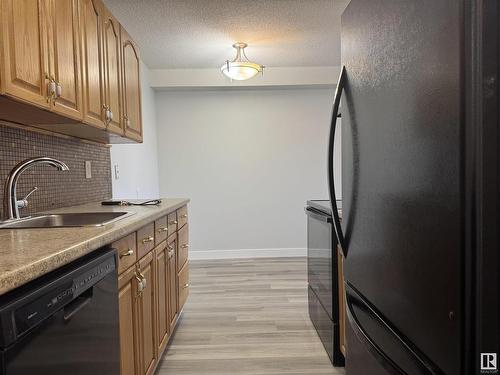 Edmonton, AB - Indoor Photo Showing Kitchen