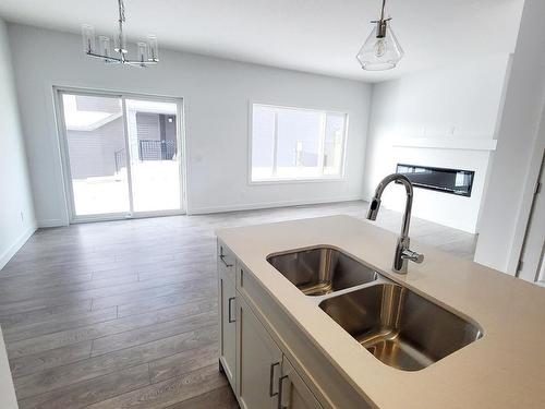 140 Rancher Road, Ardrossan, AB - Indoor Photo Showing Kitchen With Double Sink