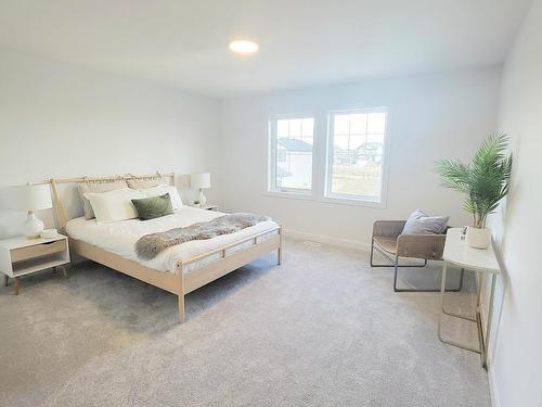 140 Rancher Road, Ardrossan, AB - Indoor Photo Showing Bedroom