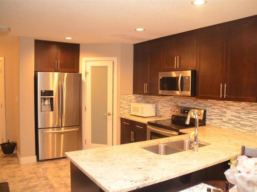 16715 60 Street, Edmonton, AB - Indoor Photo Showing Kitchen With Stainless Steel Kitchen With Double Sink With Upgraded Kitchen