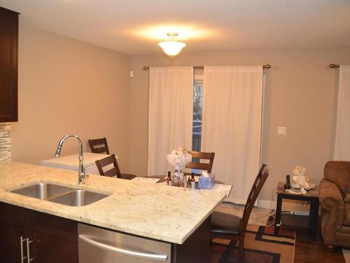 16715 60 Street, Edmonton, AB - Indoor Photo Showing Kitchen With Double Sink