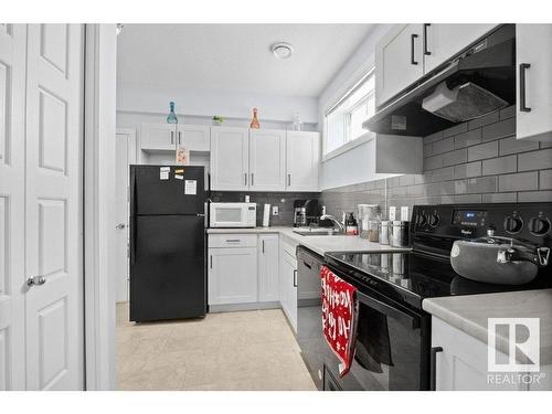 3707 48 Avenue, Beaumont, AB - Indoor Photo Showing Kitchen