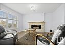 3707 48 Avenue, Beaumont, AB  - Indoor Photo Showing Living Room With Fireplace 