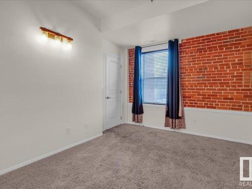 406 10728 82 Avenue, Edmonton, AB - Indoor Photo Showing Other Room