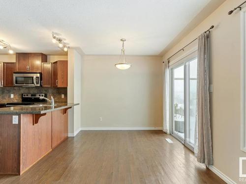 128 5420 Grant Macewan Blvd, Leduc, AB - Indoor Photo Showing Kitchen