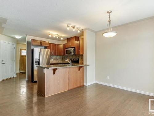 128 5420 Grant Macewan Blvd, Leduc, AB - Indoor Photo Showing Kitchen