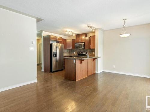 128 5420 Grant Macewan Blvd, Leduc, AB - Indoor Photo Showing Kitchen