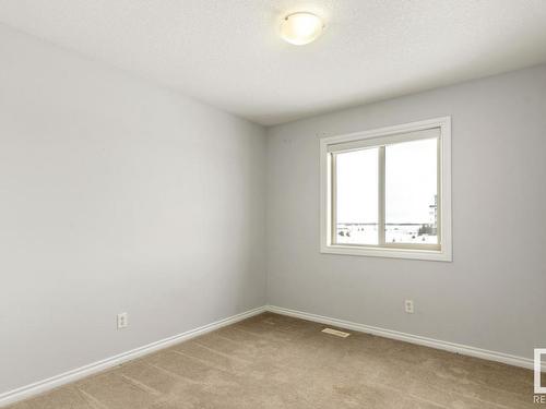 128 5420 Grant Macewan Blvd, Leduc, AB - Indoor Photo Showing Other Room