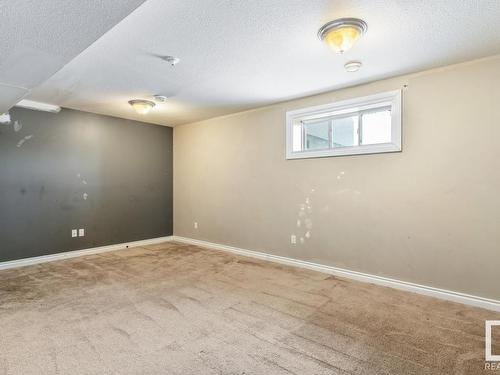 128 5420 Grant Macewan Blvd, Leduc, AB - Indoor Photo Showing Other Room