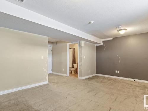 128 5420 Grant Macewan Blvd, Leduc, AB - Indoor Photo Showing Other Room