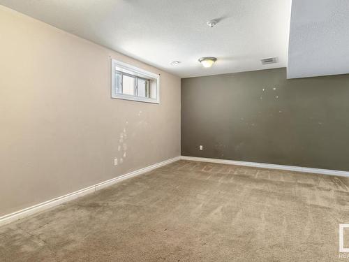 128 5420 Grant Macewan Blvd, Leduc, AB - Indoor Photo Showing Other Room