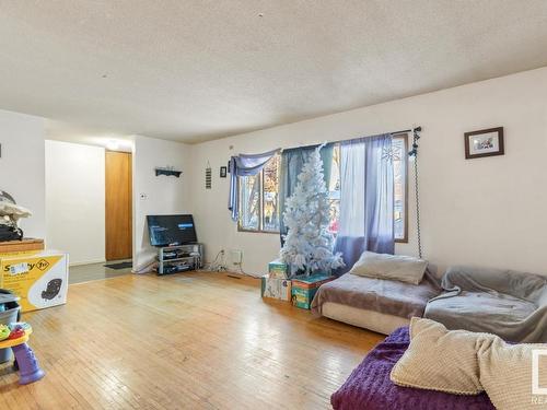 11026 150 Street, Edmonton, AB - Indoor Photo Showing Living Room