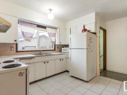 11026 150 Street, Edmonton, AB - Indoor Photo Showing Kitchen With Double Sink