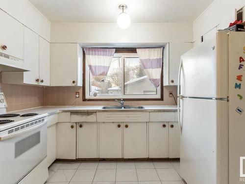 11026 150 Street, Edmonton, AB - Indoor Photo Showing Kitchen With Double Sink