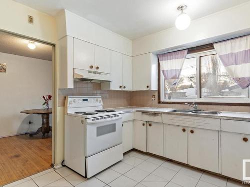 11026 150 Street, Edmonton, AB - Indoor Photo Showing Kitchen With Double Sink