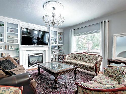 329 Heath Road, Edmonton, AB - Indoor Photo Showing Living Room With Fireplace