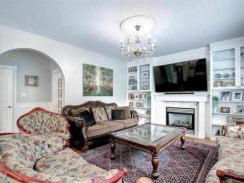 329 Heath Road, Edmonton, AB - Indoor Photo Showing Living Room With Fireplace