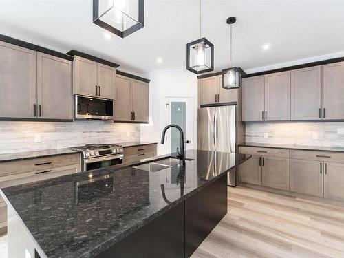 2 54104 Rge Road 274, Rural Parkland County, AB - Indoor Photo Showing Kitchen With Upgraded Kitchen