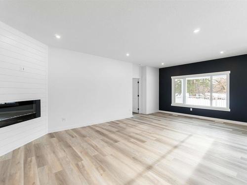 2 54104 Rge Road 274, Rural Parkland County, AB - Indoor Photo Showing Other Room With Fireplace