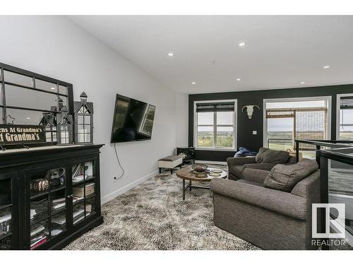 404 9940 Sherridon Drive, Fort Saskatchewan, AB - Indoor Photo Showing Living Room