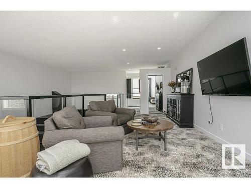 404 9940 Sherridon Drive, Fort Saskatchewan, AB - Indoor Photo Showing Living Room