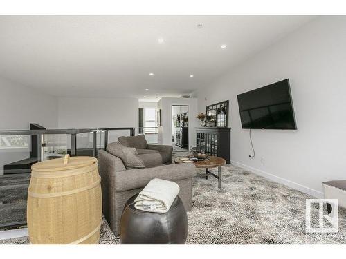 404 9940 Sherridon Drive, Fort Saskatchewan, AB - Indoor Photo Showing Living Room