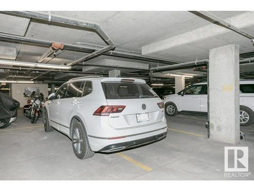 404 9940 Sherridon Drive, Fort Saskatchewan, AB - Indoor Photo Showing Garage