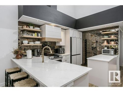 404 9940 Sherridon Drive, Fort Saskatchewan, AB - Indoor Photo Showing Kitchen